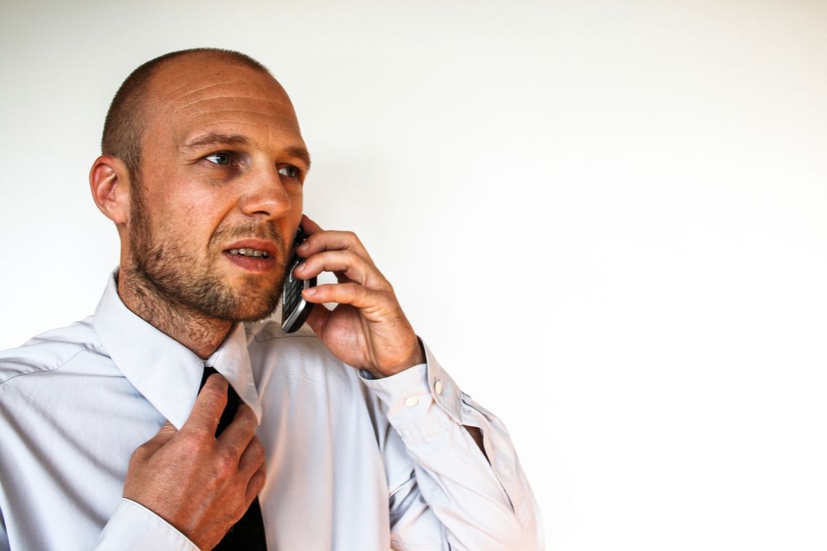 A man trying to make a hoax 911 call.