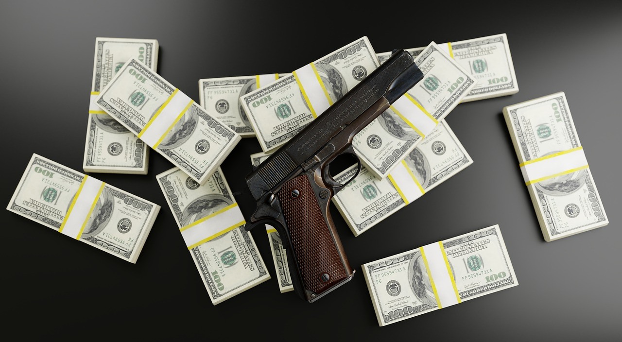 Guns and money, a symbol of crime syndicates.