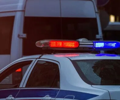 Police car roaming in the city