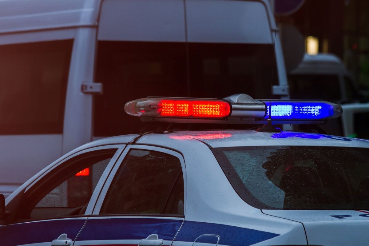 Police car roaming in the city