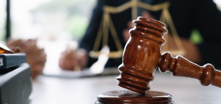 A gavel and block during a court hearing.