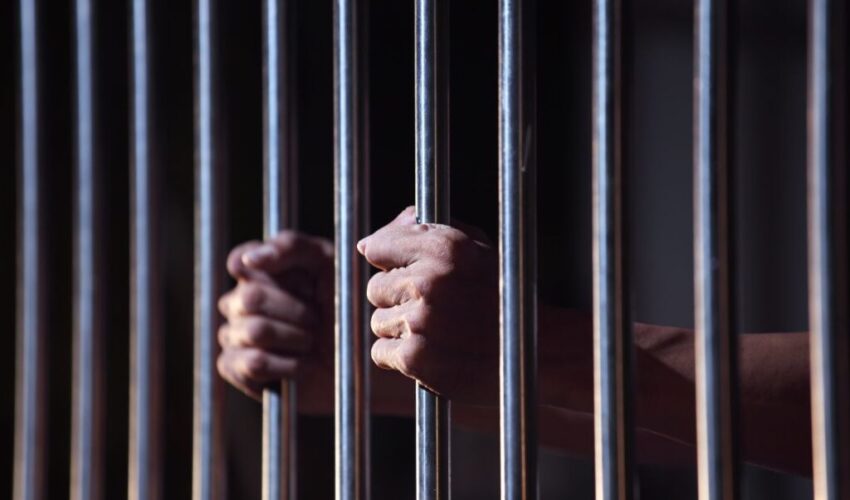 An inmate inside the prison cell.