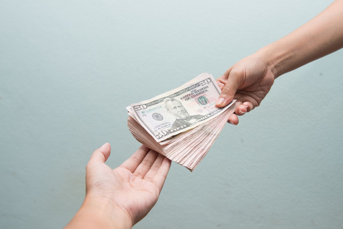 A person receiving money from an inmate.